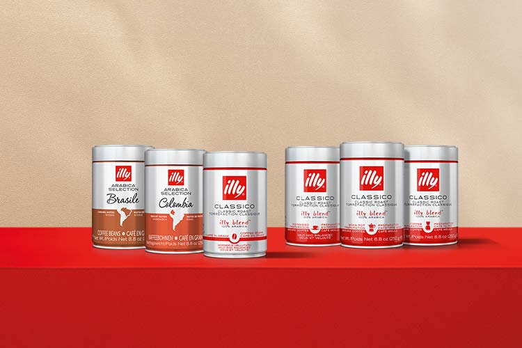 assortment of illy coffee cans