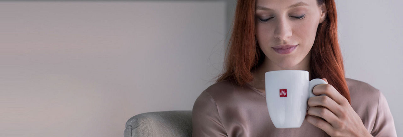 woman drinking drip coffee