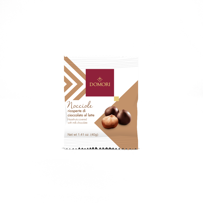 Dragees di nocciole tostate ricoperte di cioccolato al latte Domori