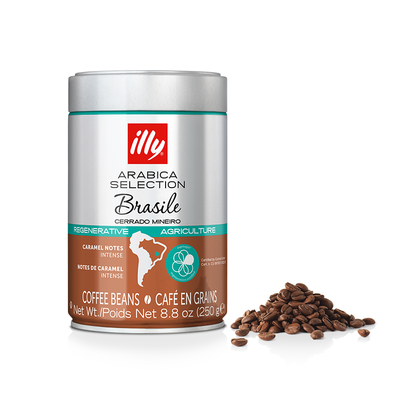 Coffee beans next to a can of Arabica Selection Brasile - Cerrado Mineiro in Whole Bean